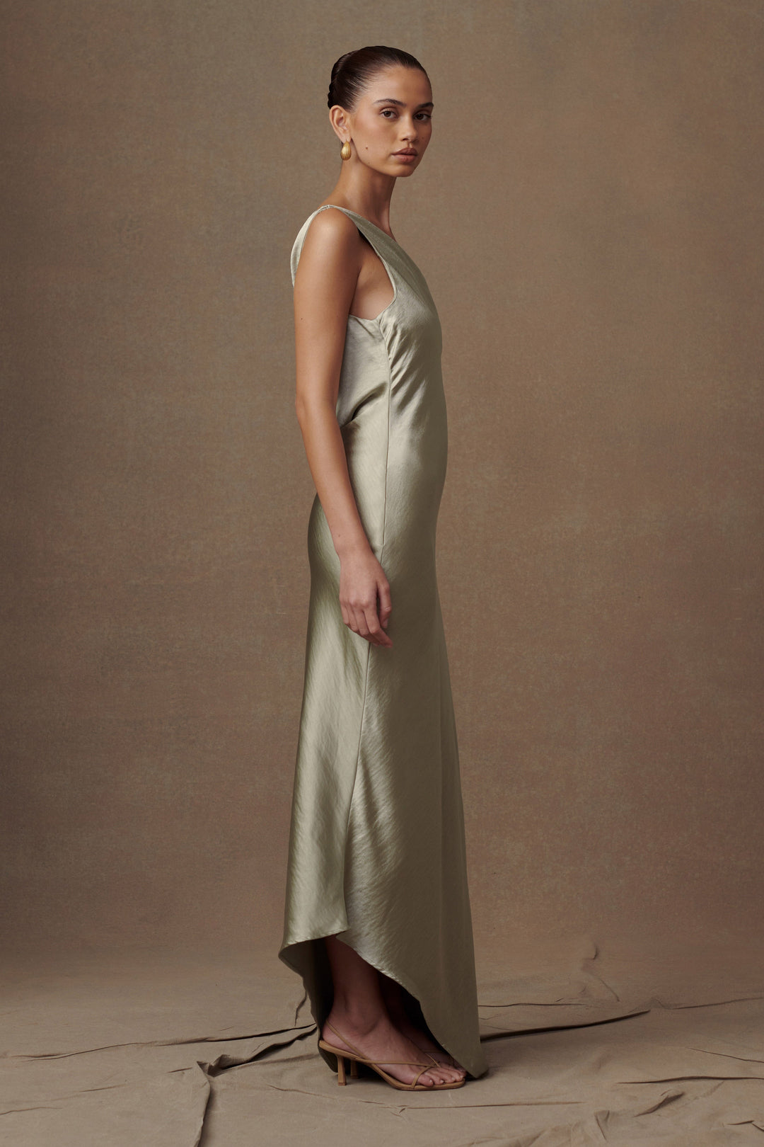 Glamcroft Slip Maxi Dress with Asymmetrical Hem in Sage