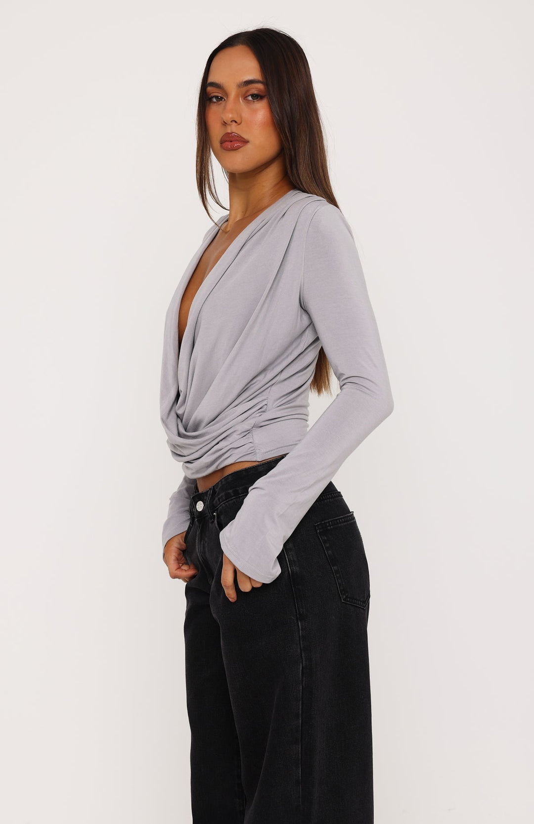 Glamcroft Long Sleeve Top with Plunge Neckline and Crossover Waist