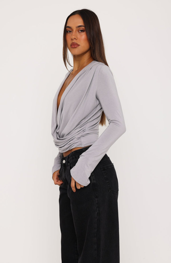 Glamcroft Long Sleeve Top with Plunge Neckline and Crossover Waist
